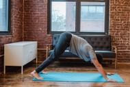 The downward-facing dog pose. (Image via Pexels/ Neilsen)